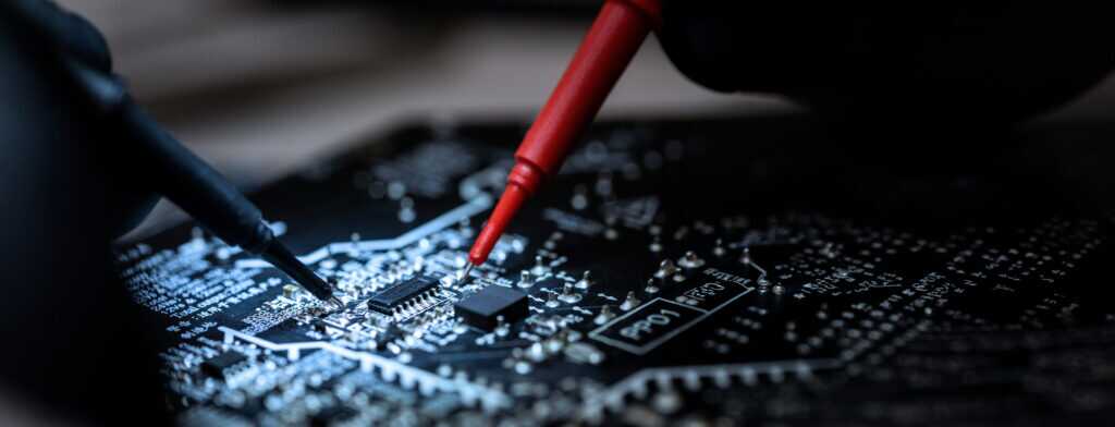 Closeup Of Technician Repairing Peace Of Motherboard Using Profe