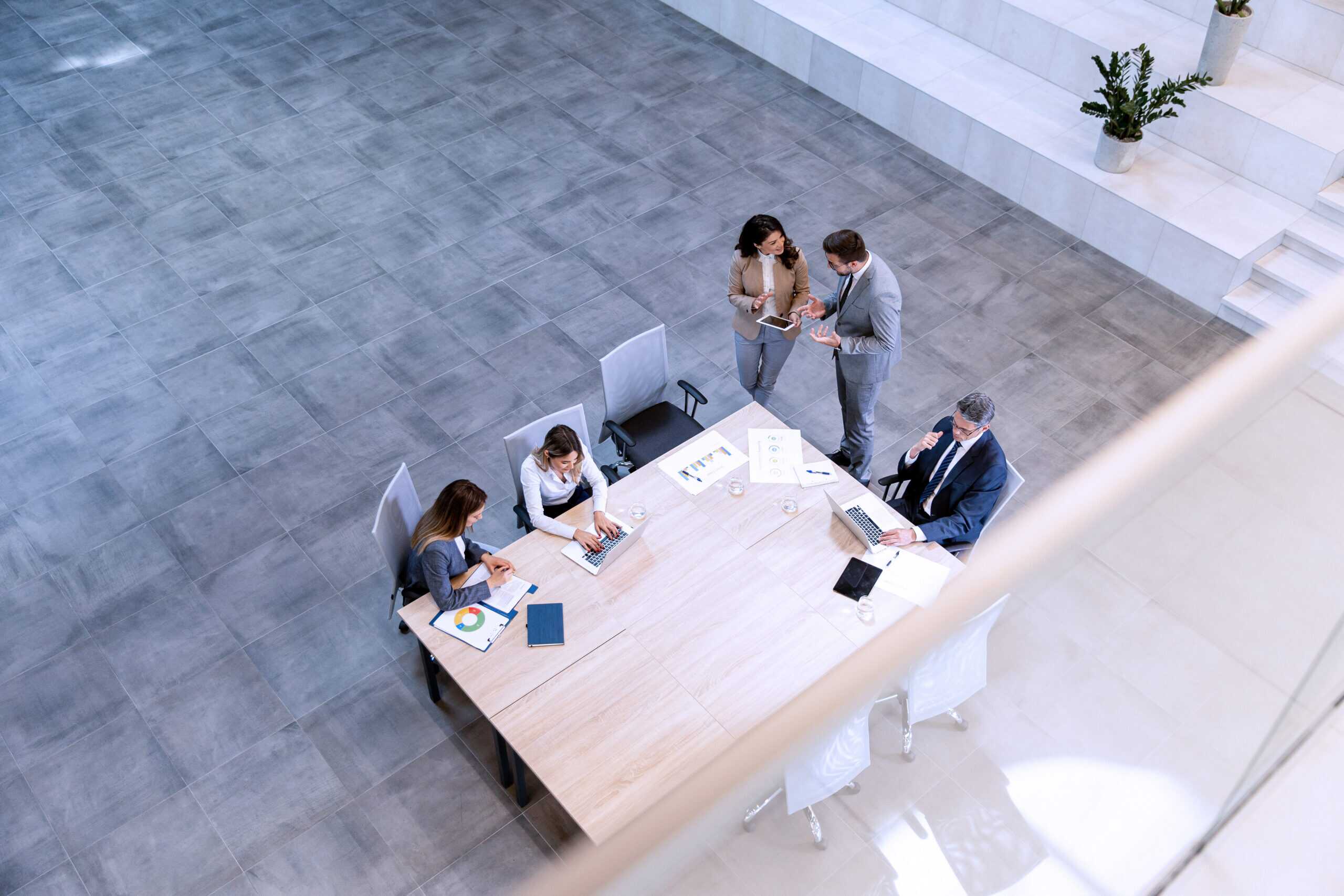 Aerial View At Young Startup Team Working In The Office