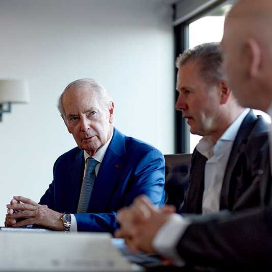 Peter Rigby in board meeting.