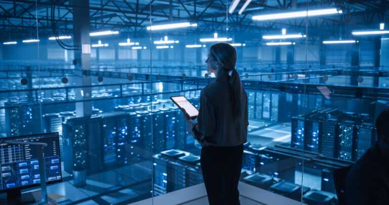 Female Information Technology Engineer Reviews Security Logs On